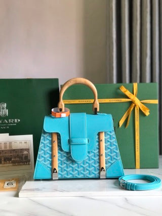 Monogram Luxe Top Handle Collection