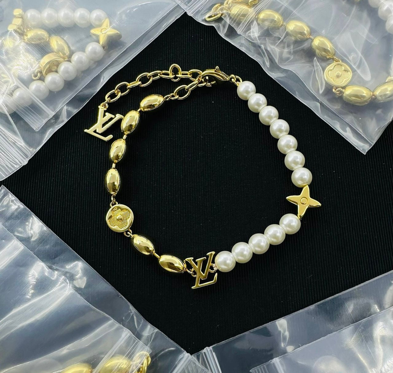 Pearl Royale Gold Charm Bracelet