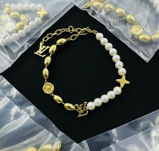 Pearl Royale Gold Charm Bracelet