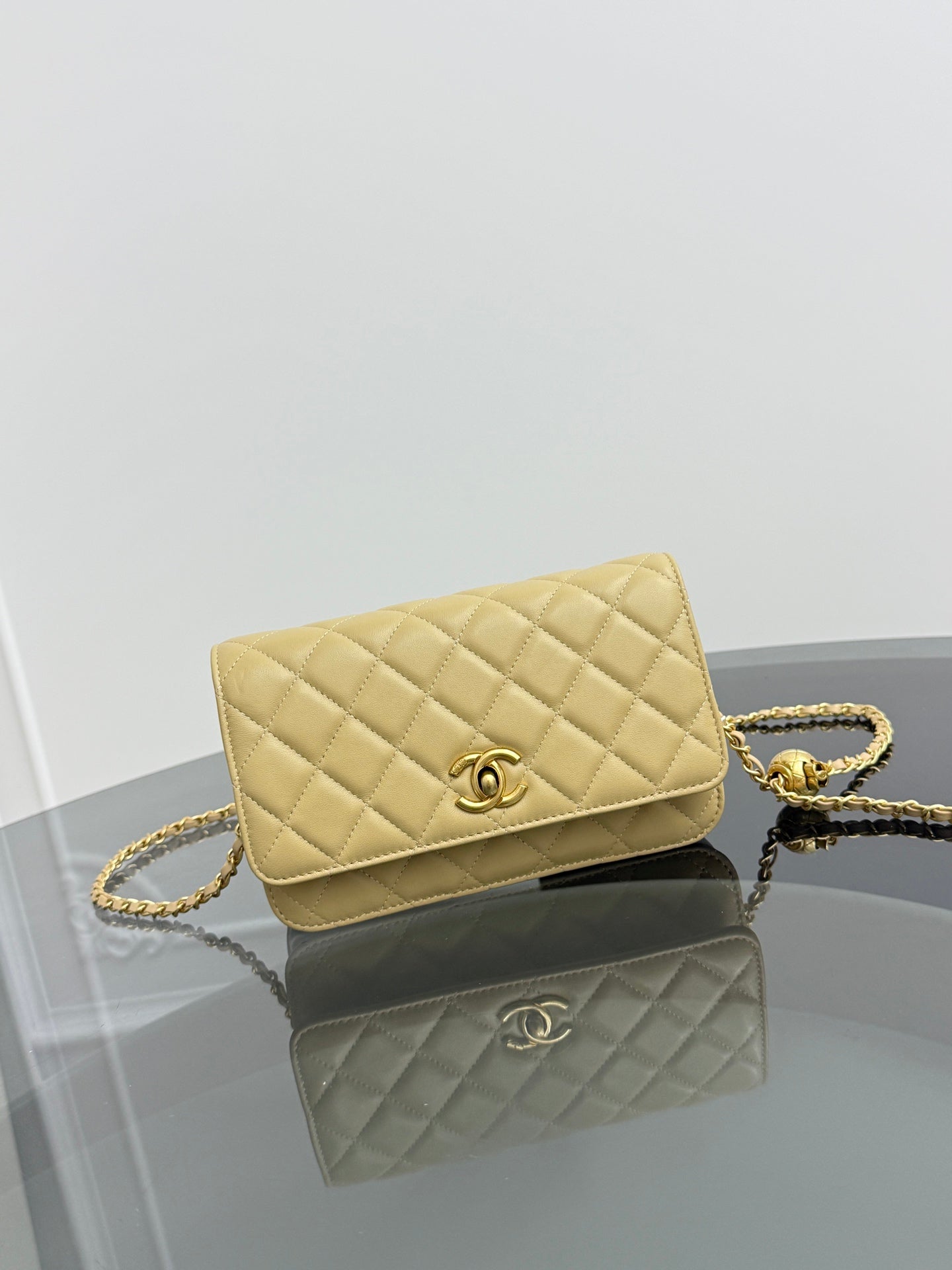 This little Chanel gold ball WOC (Wallet on Chain) is so cute
