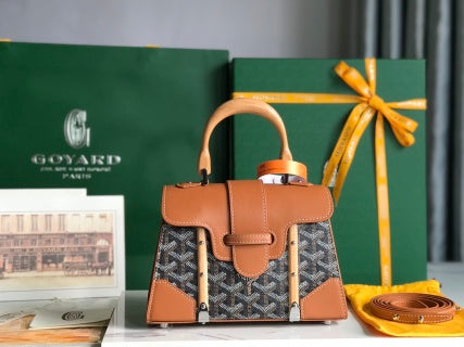 Monogram Luxe Top Handle Collection