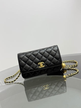 This little Chanel gold ball WOC (Wallet on Chain) is so cute